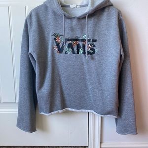 Gray Vans hoodie with flower embroidery comes in a women’s/junior size XS .